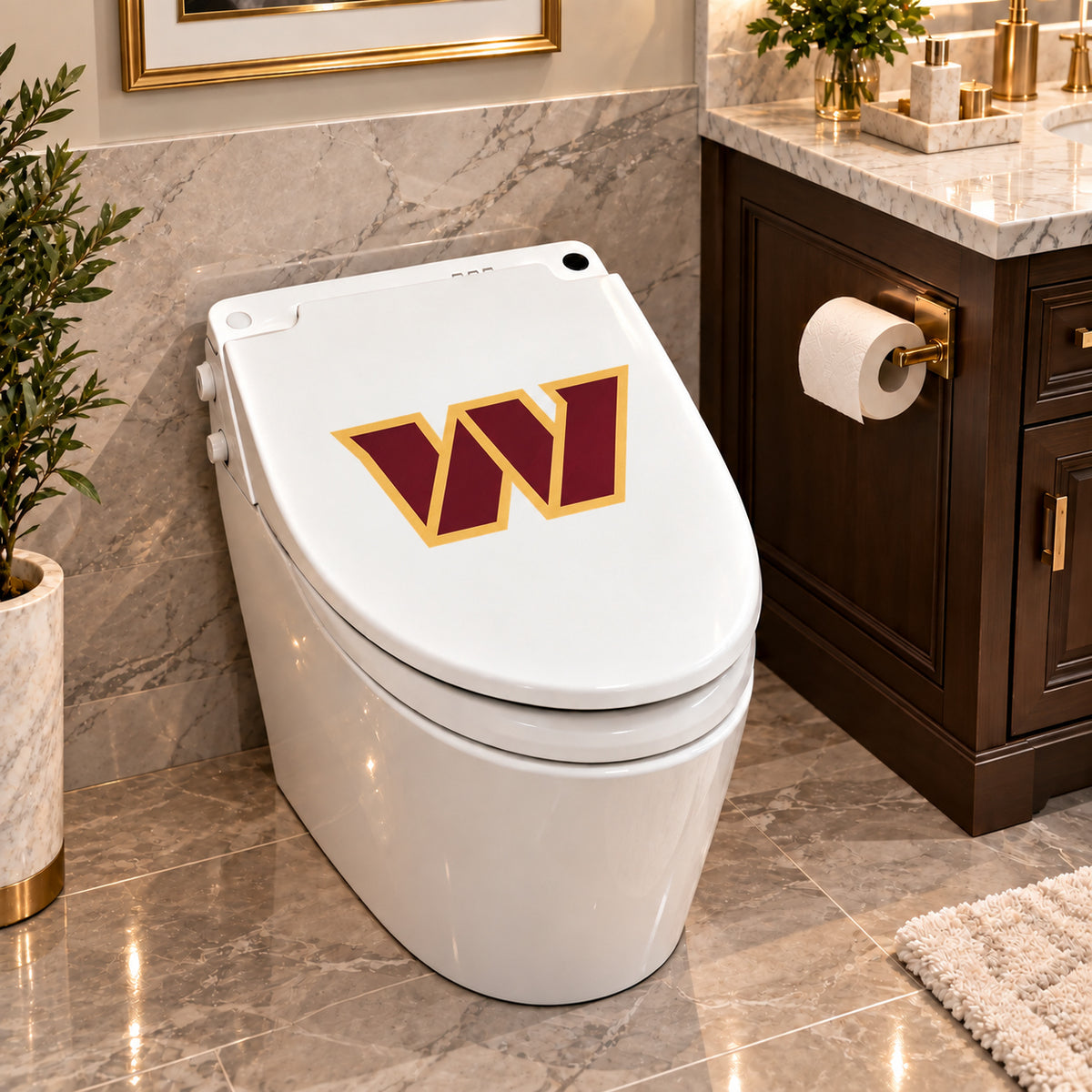 Washington Commanders decorative sticker on a closed white toilet lid in a marble bathroom